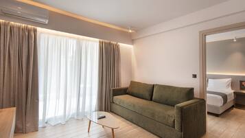 Family Apartment | Living area | 55-inch Smart TV with digital channels, TV