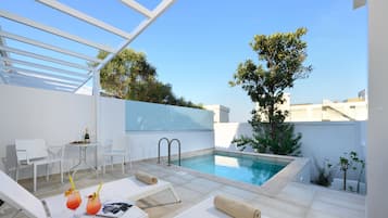 Junior suite, privézwembad | Kameruitzicht