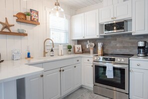 Fridge, microwave, oven, stovetop - Anna Maria Beach Cottage 107A  Pool, bikes, beach gear, moments from the sand! (Anna Maria)