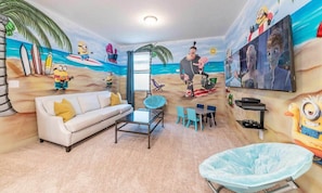 Flat-screen TV, video-game console, foosball