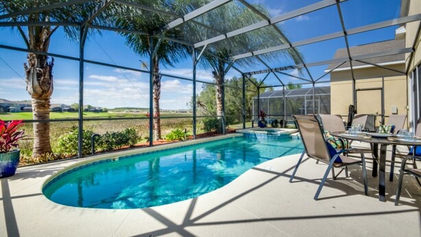A covered outdoor swimming pool with a view of the surrounding landscape. - Luxury 5 Bed Villa, Perfect for Large Groups, 1005 (Davenport)