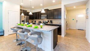 Microwave, oven, stovetop, dishwasher - Luxury 5 Bedroom Townhome on Windsor at Westside Resort, Orlando Townhome 2795 (Kissimmee)