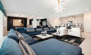 Flat-screen TV, video game console, table football