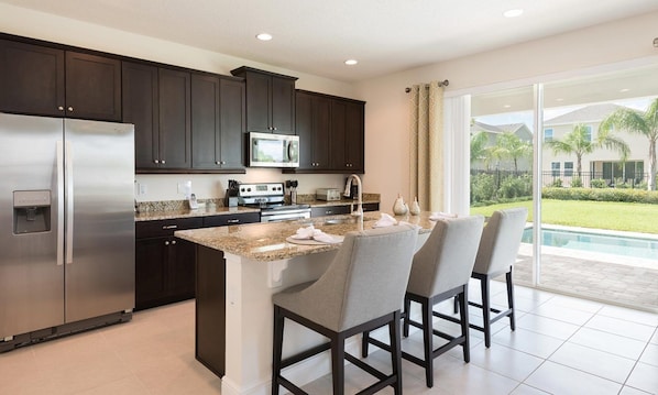 Microwave, oven, stovetop, dishwasher - Rent This Luxury 5 Star Villa on Encore Resort at Reunion, Orlando Villa 4412 (Kissimmee)