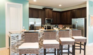 Fridge, microwave, oven, stovetop - Rent Your Own Orlando Villa With Large Private Pool on Encore Resort at Reunion, Orlando Villa 4690 (Kissimmee)