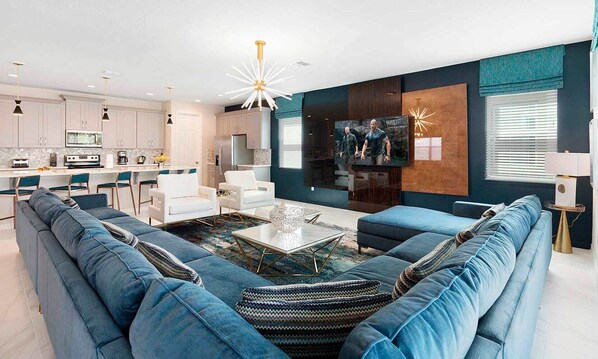 Flat-screen TV, video-game console, foosball