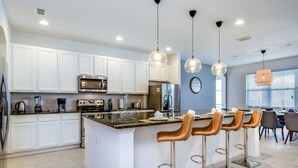 Microwave, oven, stovetop, dishwasher - Rent a Luxury Mansion on Solterra Resort, Minutes From Disney, Orlando Mansion 2777 (Davenport)