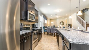 Microwave, oven, stovetop, dishwasher - Rent a Luxury Villa on Windsor at Westside Resort, Minutes From Disney, Orlando Villa 2633 (Kissimmee)