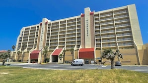 A multi-story hotel with a central tower labeled "INVERNESS."