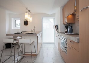 Fridge, microwave, dishwasher, coffee/tea maker