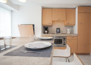 Fridge, microwave, dishwasher, coffee/tea maker