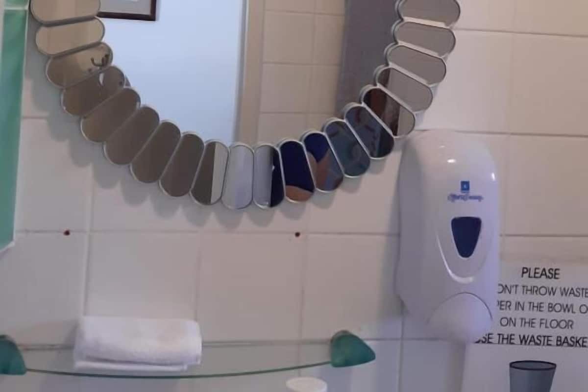 Shower, designer toiletries, hair dryer, bathrobes