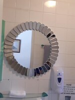 Shower, designer toiletries, hair dryer, bathrobes