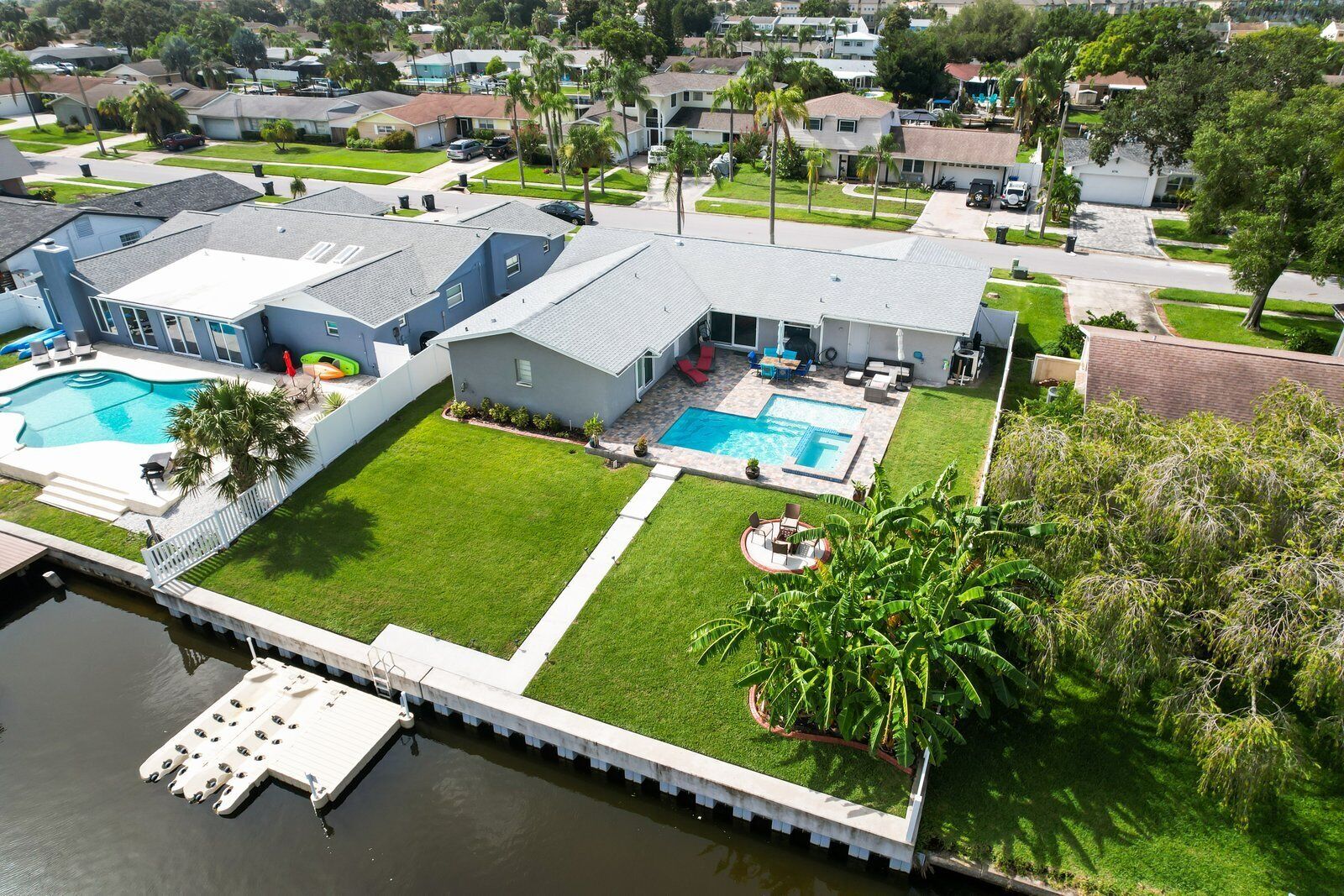 Tampa Bay waterfront pool home is waiting for you! Close to TPA, RayJay, parks! 