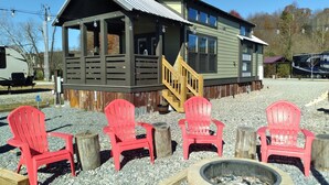 A cabin with a porch, outdoor seating, and a fire pit. - Summer Fun in Blue Ridge☀️Mins from Downtown Activities  (Morganton)