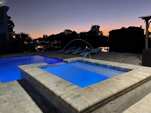 Outdoor pool, a heated pool - Hibiscus Beach House your vacation home loaded with amenities (Hernando Beach)