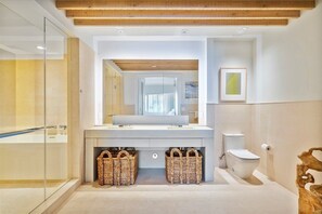 Bathtub, hair dryer, towels
