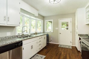 Fridge, coffee/tea maker, cookware/dishes/utensils