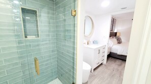 Shower, hair dryer, towels, soap