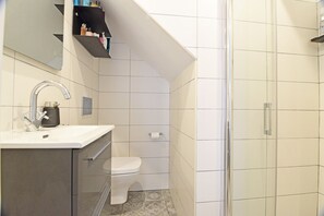 Ducha, secador de pelo, toallas