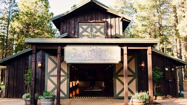 A rustic wooden building with a sign reading "The Gathering Place." - Beautiful condo on Pinetop Lakes Golf Course (Pinetop)