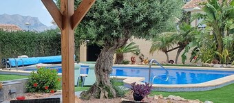  Serene mountain views. Spacious garden with 10x5m pool.