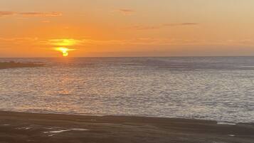 On the beach, sun loungers, beach towels