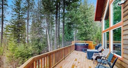 Dog-friendly mountain retreat near skiing with lake view, hot tub, & balcony