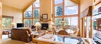 Dog-friendly mountain retreat near skiing with lake view, hot tub, & balcony