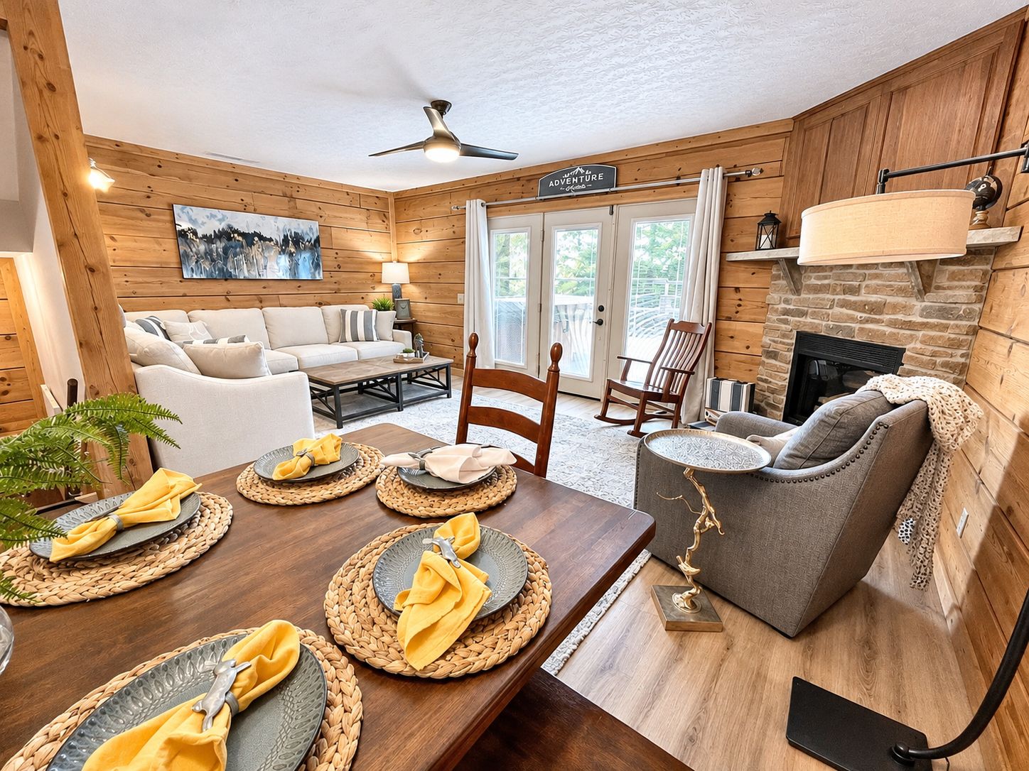 Main living area with fireplace, overlooking Flume slope for ski in and out