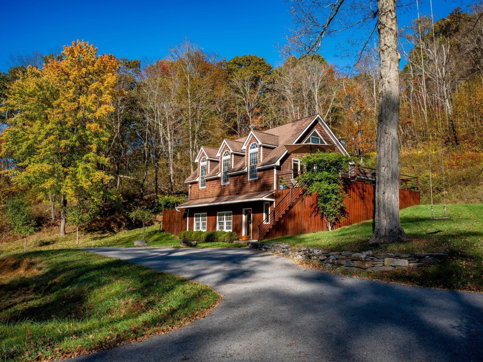 Hilltop Home on 10 acres w/ hot tub, fire-pit + solar
