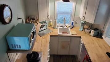 Fridge, microwave, coffee/tea maker, toaster