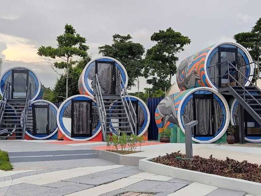 A series of spherical structures with external staircases, likely part of a modern architectural installation.