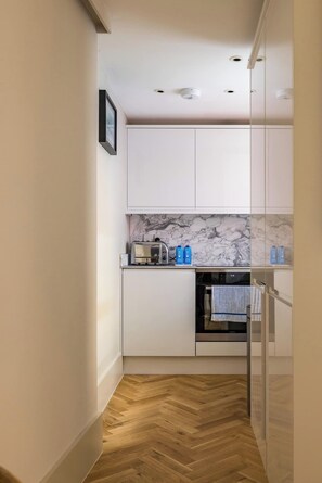 Fridge, oven, stovetop, dishwasher - The Notting Hill Apartments by HoK Living - NH1 (Greater London)