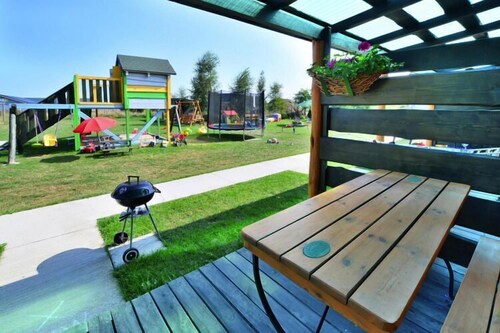 Comfortable holiday homes, garden, playground
