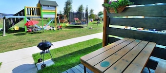 Comfortable holiday homes, garden, playground