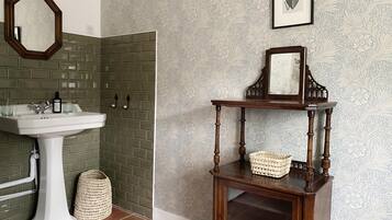 Bathtub, hair dryer, towels, soap