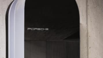 A car inside a tunnel with the word "PORSCHE" visible.