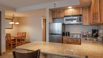 Condo, 1 Bedroom | Private kitchen | Fridge, microwave, stovetop, coffee/tea maker
