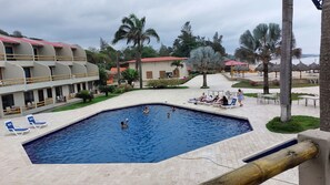 2 outdoor pools, open 10:00 AM to 8:00 PM, pool umbrellas, pool loungers