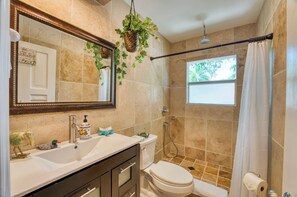 Shower, hair dryer, towels, soap