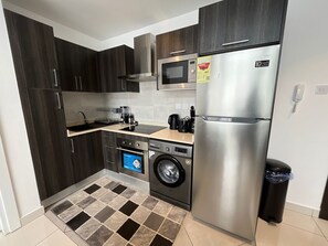 Private kitchen - Luxurious Two Bedroom Duplex  at Embassy Gardens (Accra)