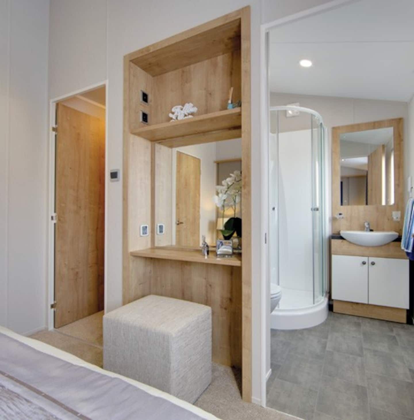 Combined shower/tub, hair dryer, towels, toilet paper