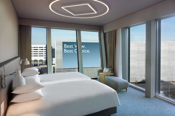 Hypo-allergenic bedding, minibar, in-room safe, desk