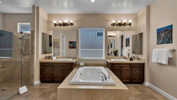 Bathtub, jetted tub, hair dryer, towels