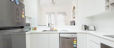 Appartement | Cuisine privée | Bouilloire électrique, grille-pain