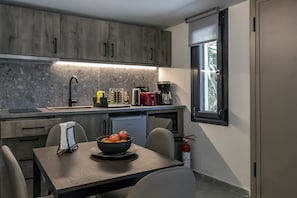 Microwave, coffee/tea maker, cookware/dishes/utensils