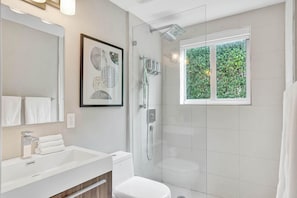 Shower, hair dryer, towels, soap