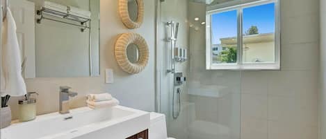 Shower, hair dryer, towels, soap