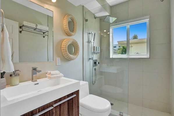 Shower, hair dryer, towels, soap